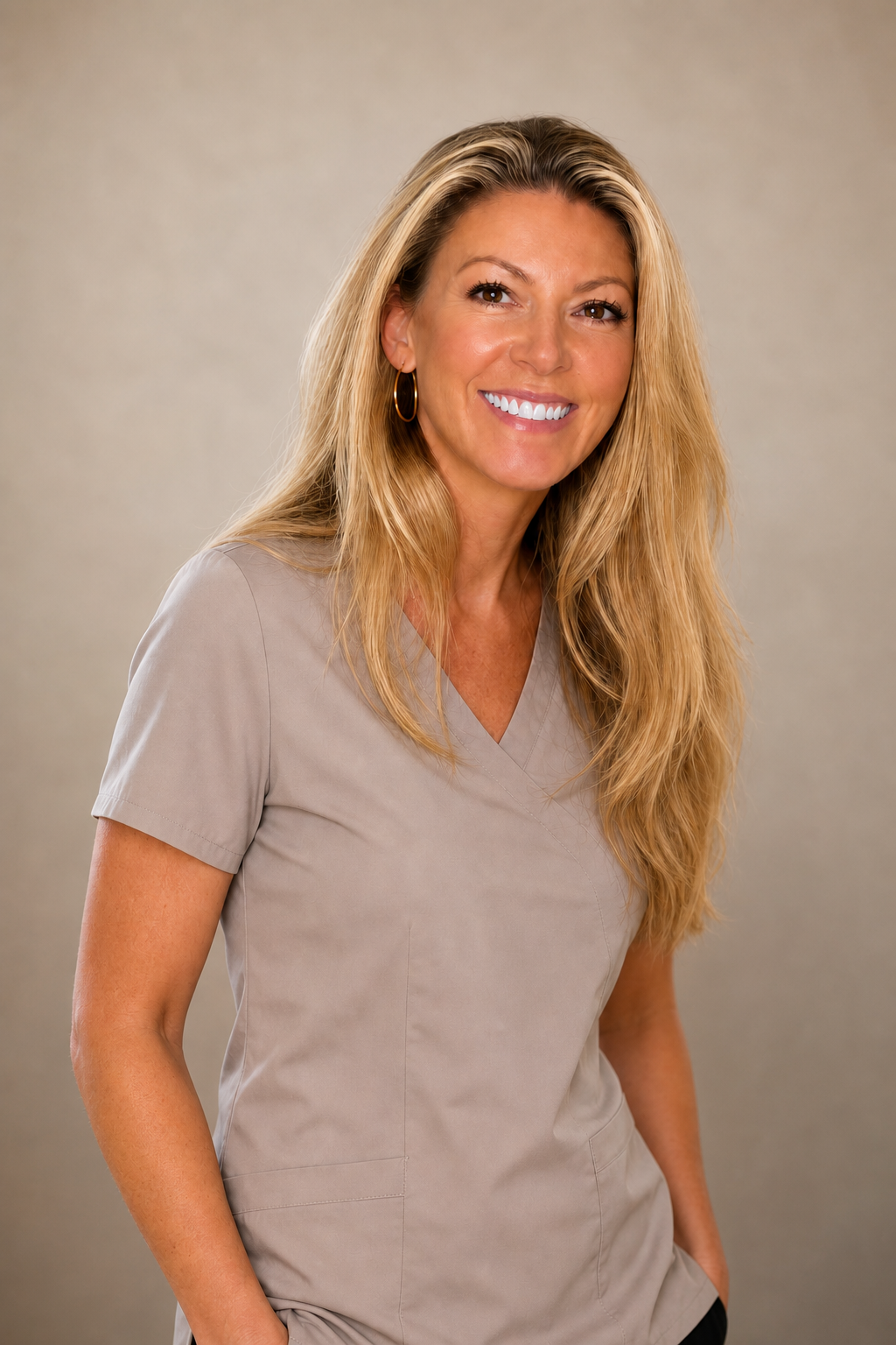 Portrait of Ally Cheetham wearing a remedial massage uniform